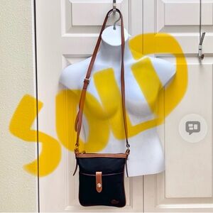 SOLD. Authentic Dooney and Bourke nylon crossbody bag